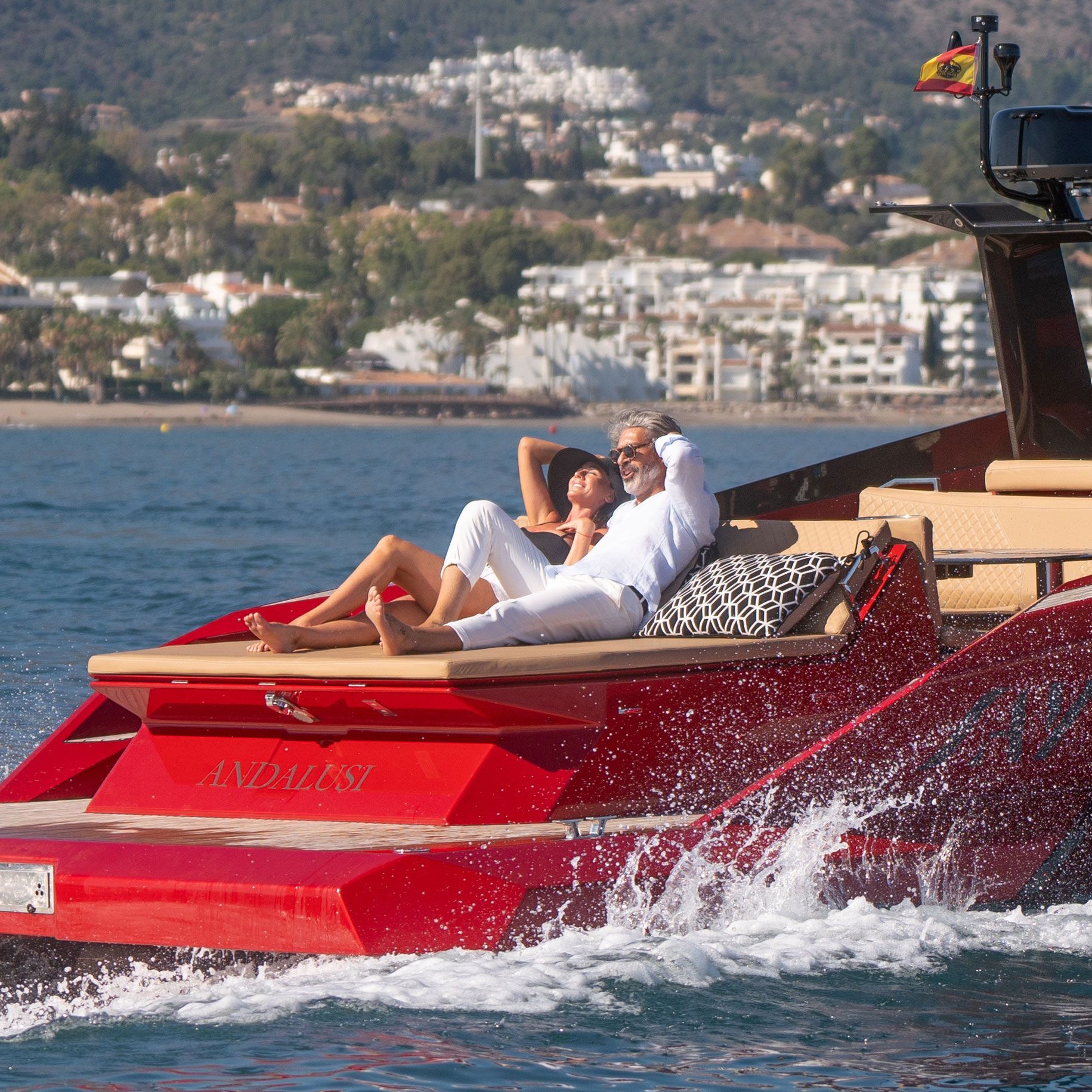 Couple relaxing on the deck of a Louis Yachting charter yacht in Marbella
