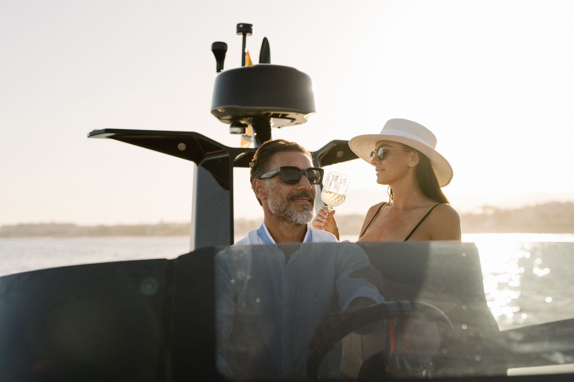 Couple relaxing on the deck of a Louis Yachting charter yacht in Marbella