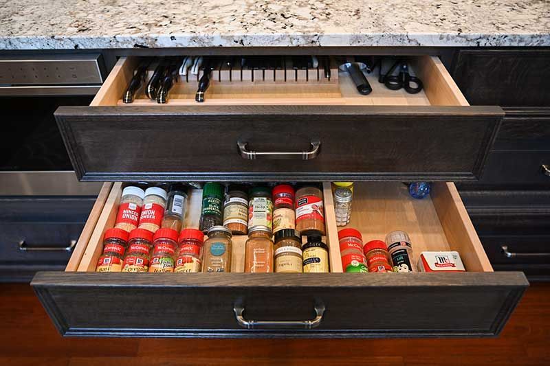 Drawer Filled with Spices and Knives | Nerstrand, MN | Nerstrand Custom Cabinets