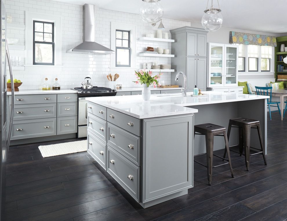 There is a large island in the middle of the kitchen.