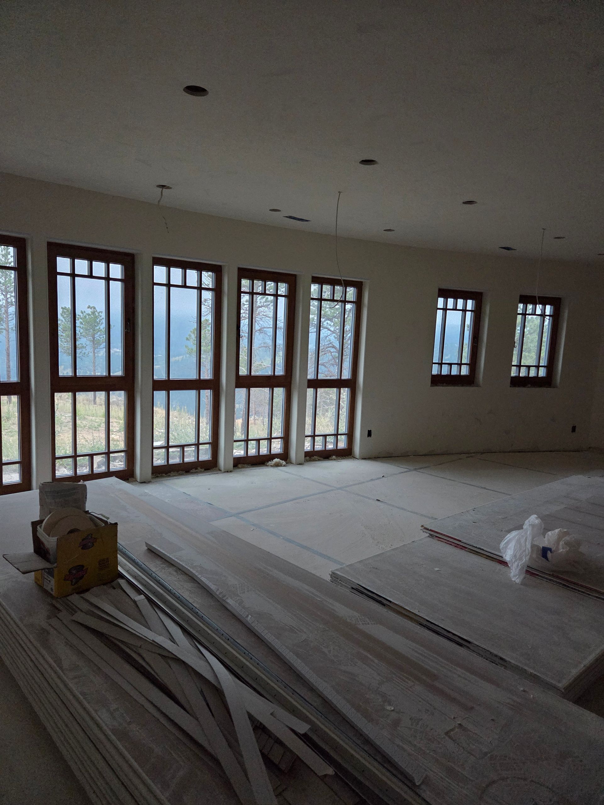 Interior wall construction with exposed insulation and metal framing. Interior wall construction with exposed insulation and metal framing.