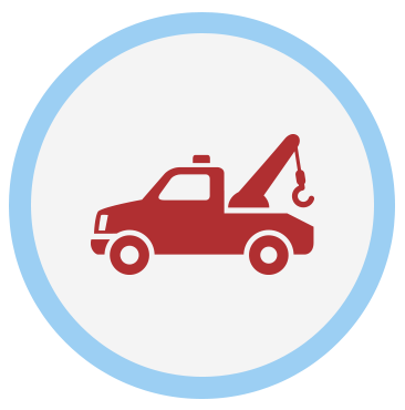 Round icon with red tow truck