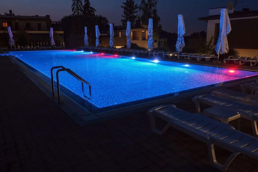 Swimming Pool is Lit Up at Night — Billabong Pool Service & Supply Pty Ltd in Buderim, QLD