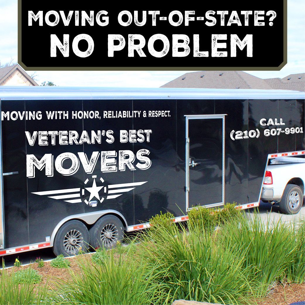 A black trailer with the words Veteran's Best Movers on it