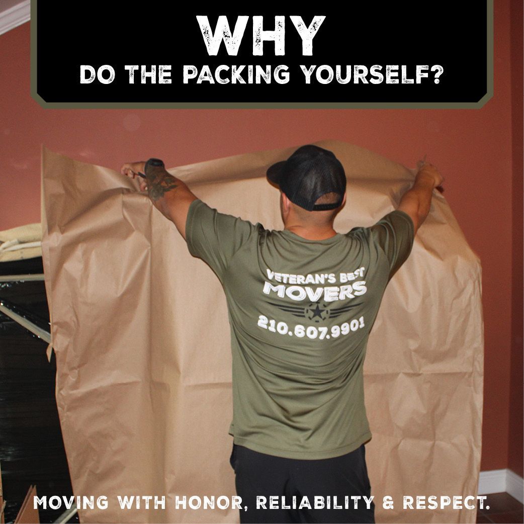 A man wearing a shirt that says Veteran's Best Movers