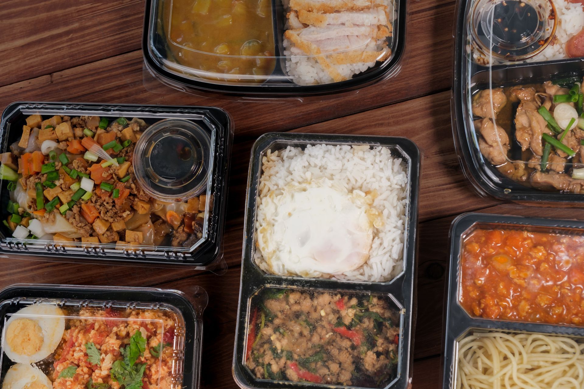 Food plastic package on a coloured background.