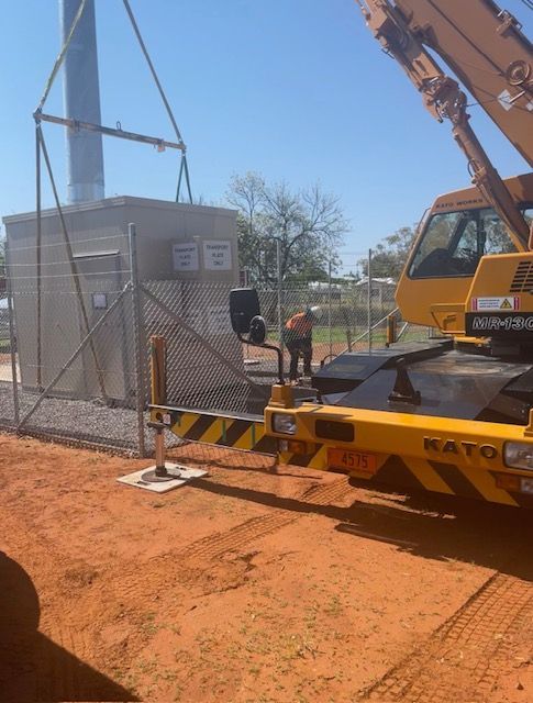 A yellow crane with the word kato on the side-Crane Hire in Alice Spring, NT