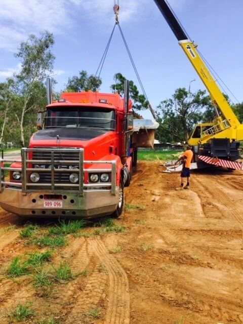 Crane Unloading the Load of the Truck — Crane Hire in Alice Spring, NT