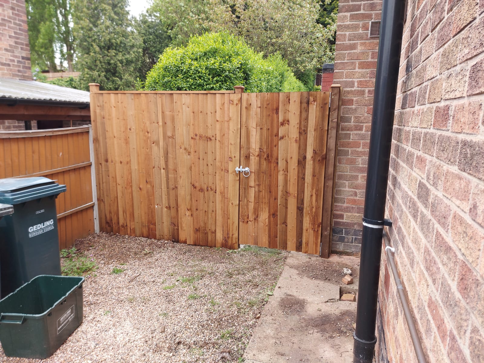 Fencing York wide wooden garden gate with fencing from outside