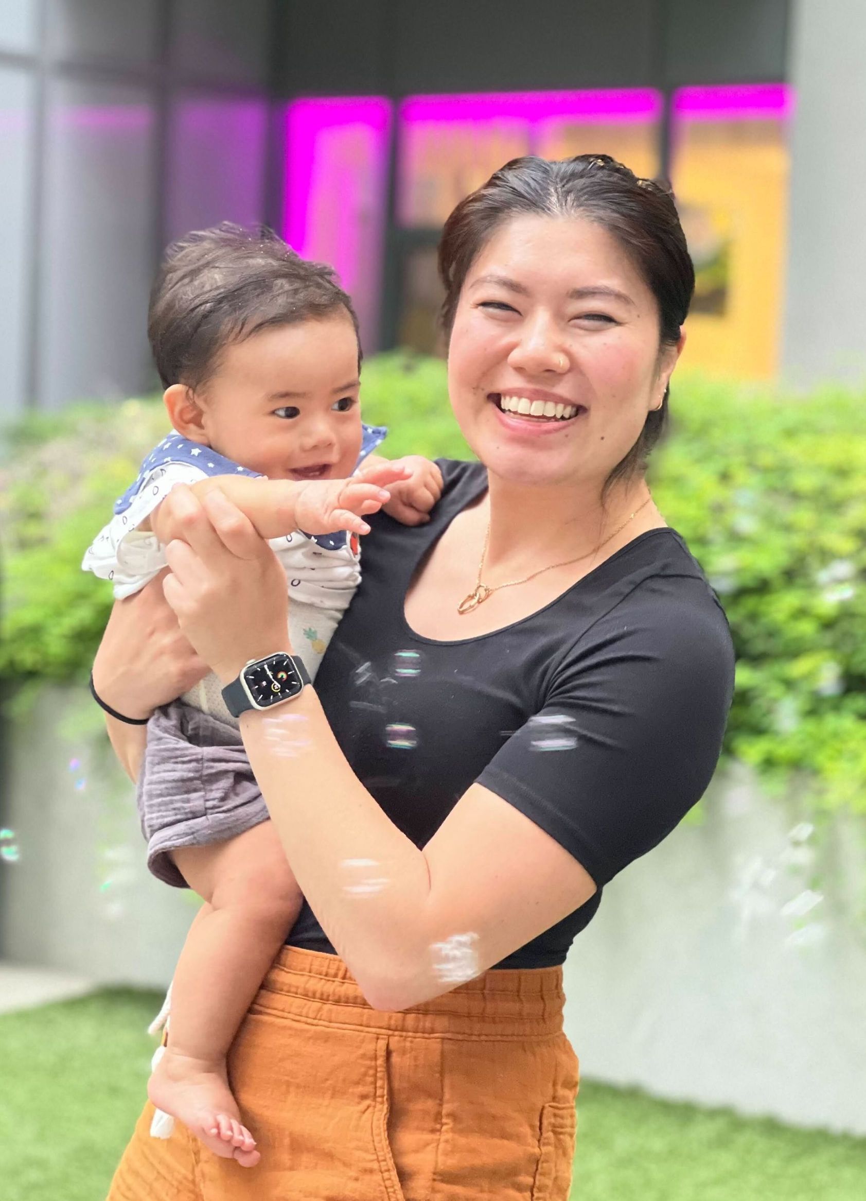Kana Shishikura holding a baby