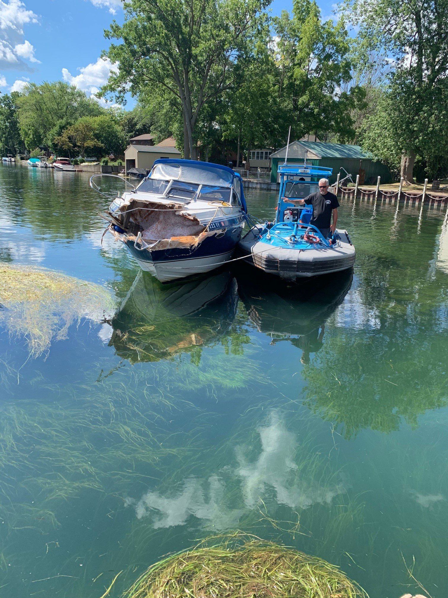 Towing Of Damaged Boat — Buffalo, NY — John’s Towing & Storage