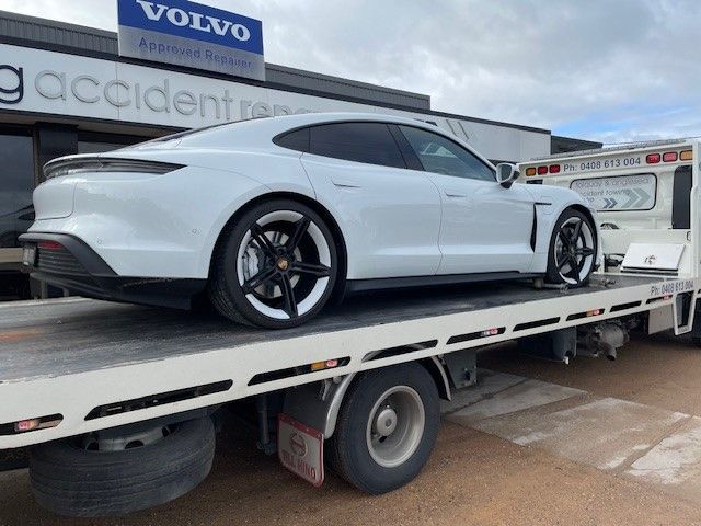 A Blue Van Is Sitting on Top of A Tow Truck — Lorne Breakdown and Towing Service in Lorne, VIC