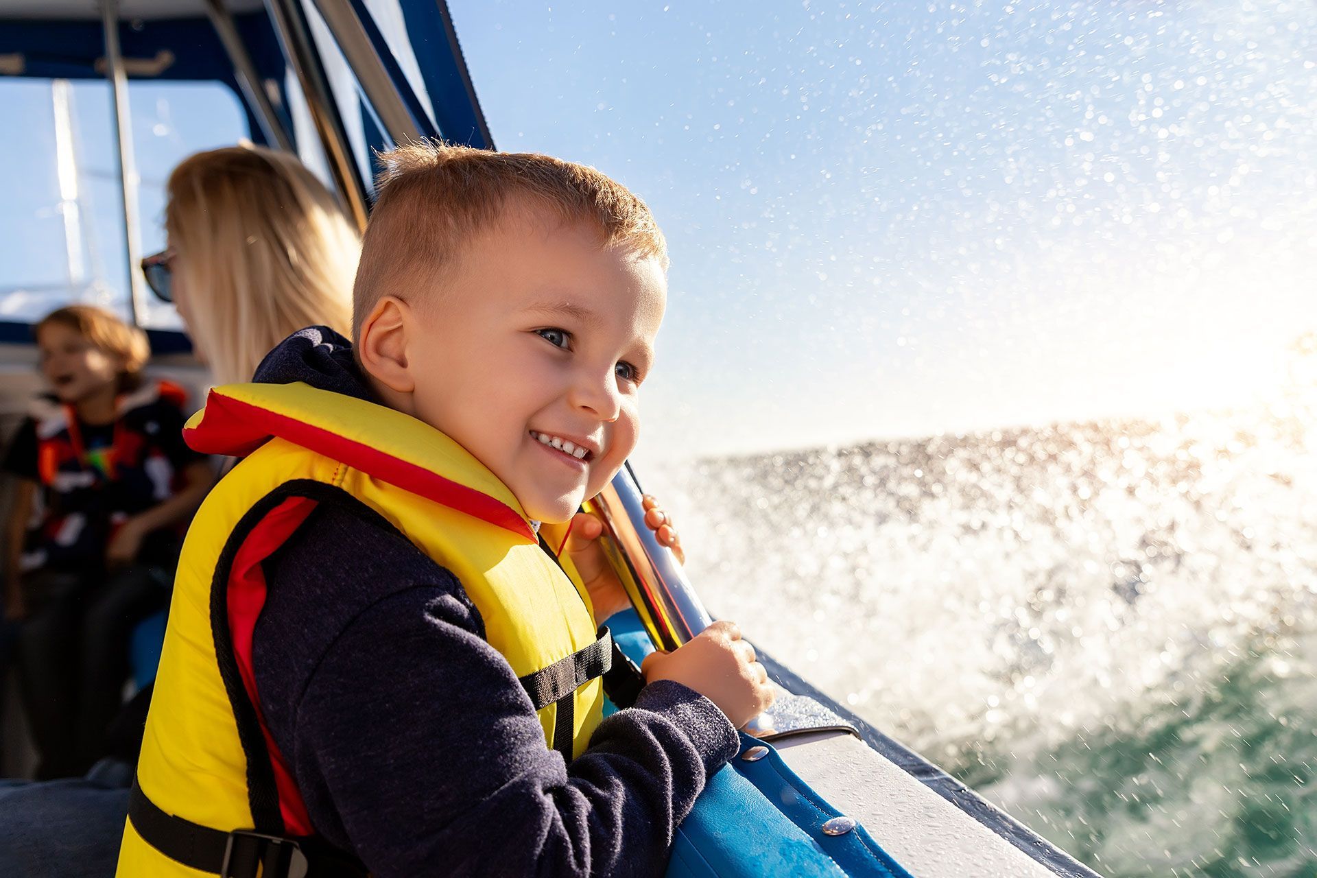 Family Boat Rental with smiling child