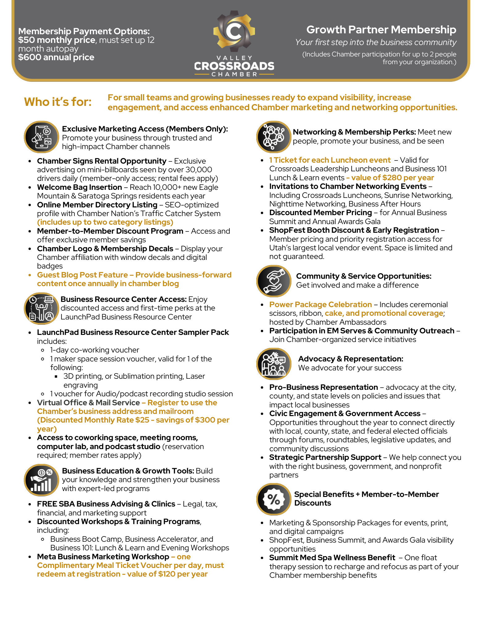 A woman is sitting at a desk talking on a cell phone