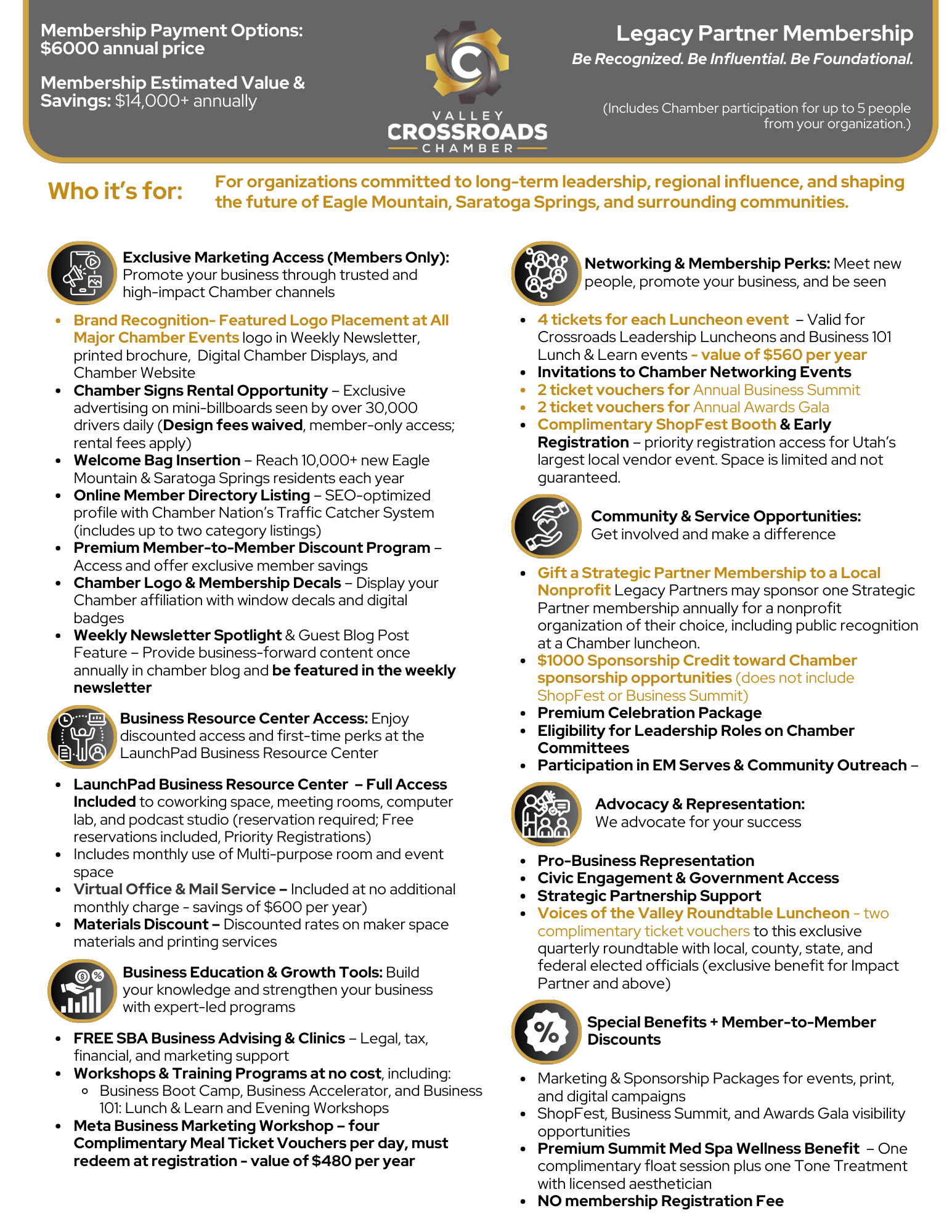 A woman is sitting at a desk talking on a cell phone