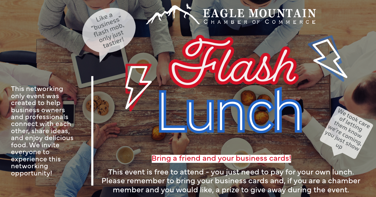 A group of people are sitting around a table with a sign that says flash lunch