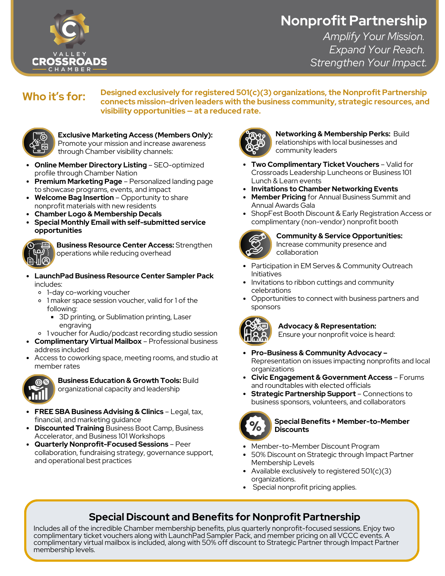 A woman is sitting at a desk talking on a cell phone