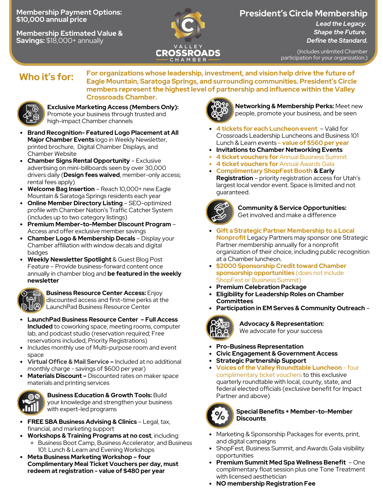 A woman is sitting at a desk talking on a cell phone