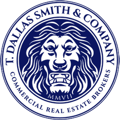 Logo: Blue circular seal with a lion's face and text 