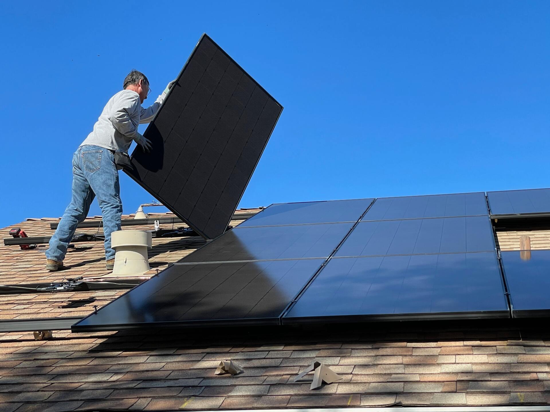 Solar Panels being installed on a roof top