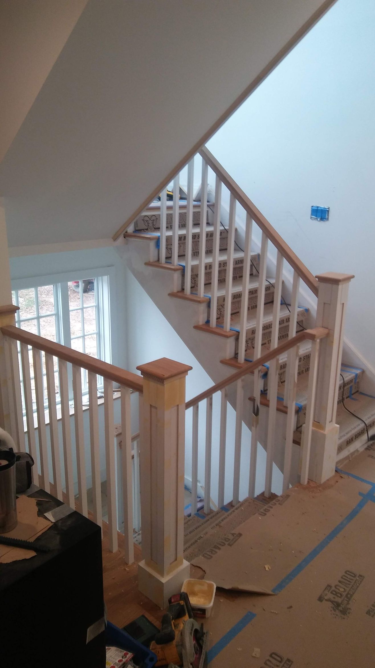 A staircase is being built in a house.