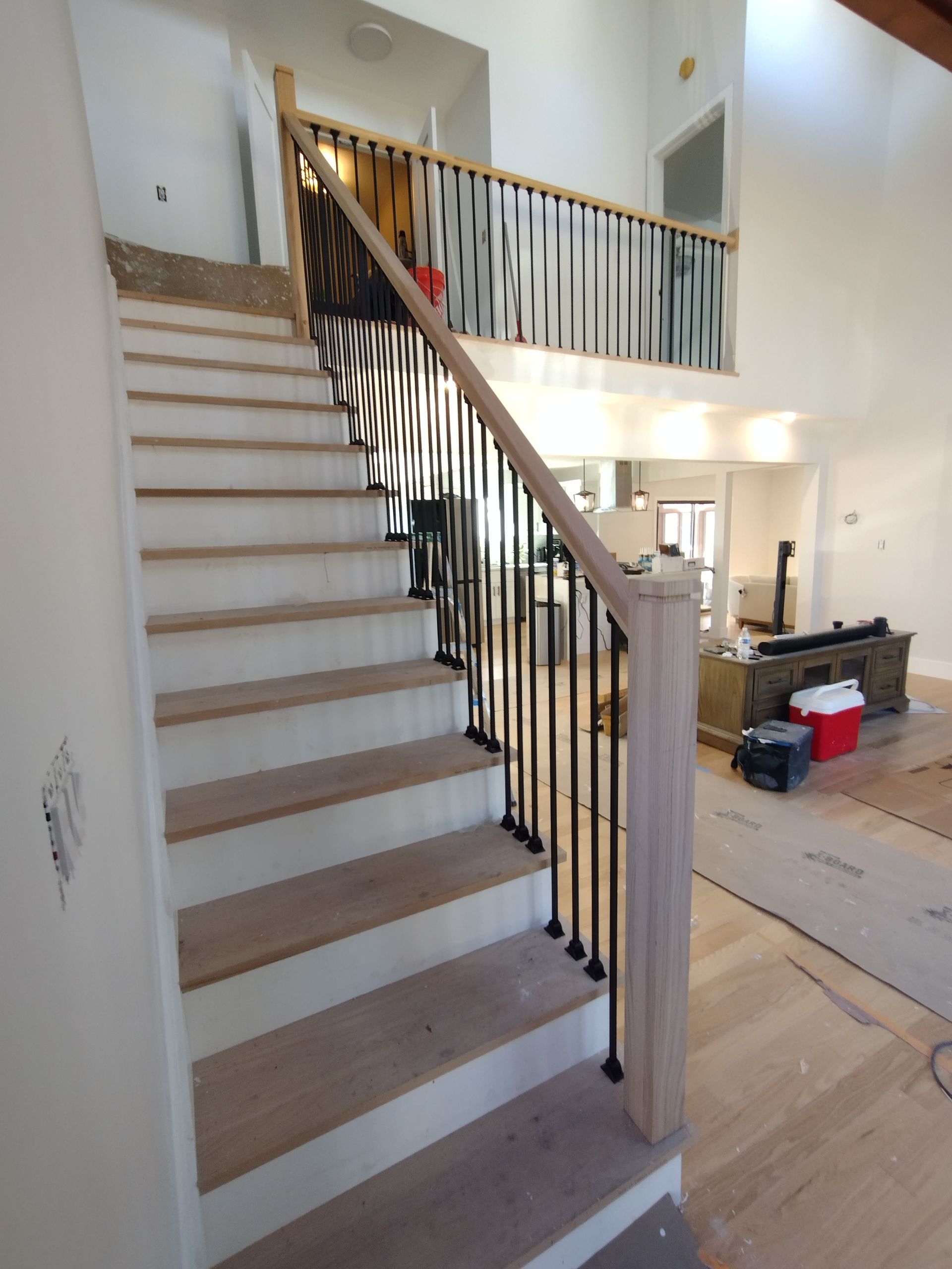 A set of stairs leading up to the second floor of a house