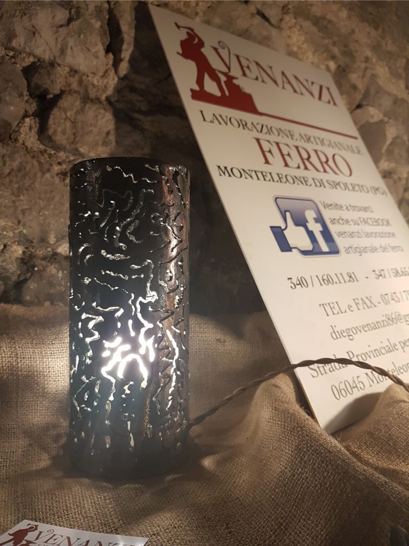 Candela intagliata in ferro