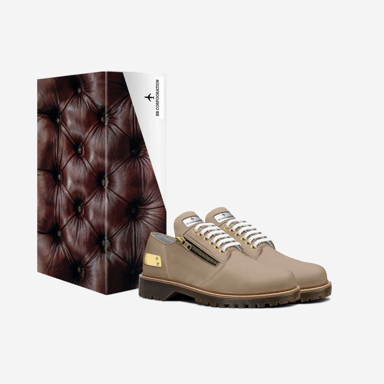 Tan leather shoes with white laces and a box with brown button-tufted leather design.