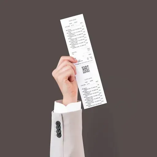 Hand holding receipt for POS data shredding Santa Clara