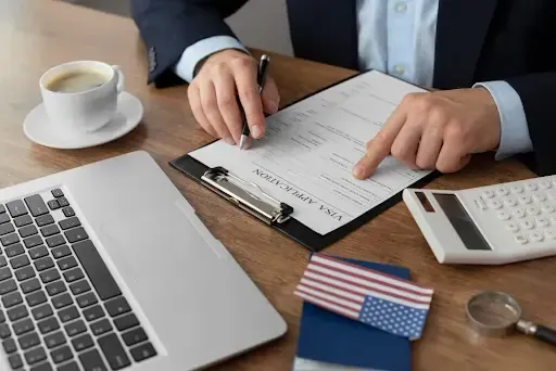 Person reviewing official papers, highlighting government document shredding compliance.
