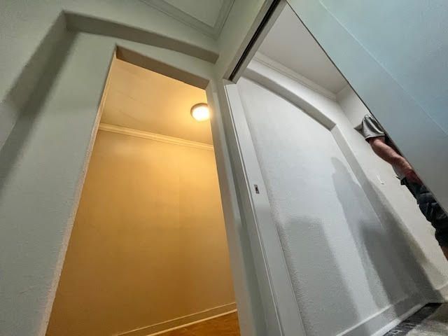 White doorway into a small, brightly lit room