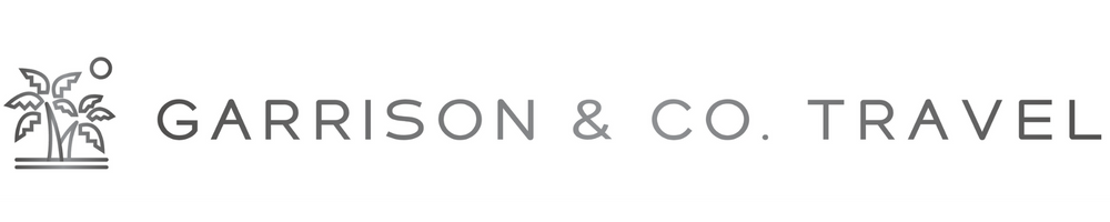 Logo for Garrison & Co. Travel featuring a stylized tree with a small sun icon.