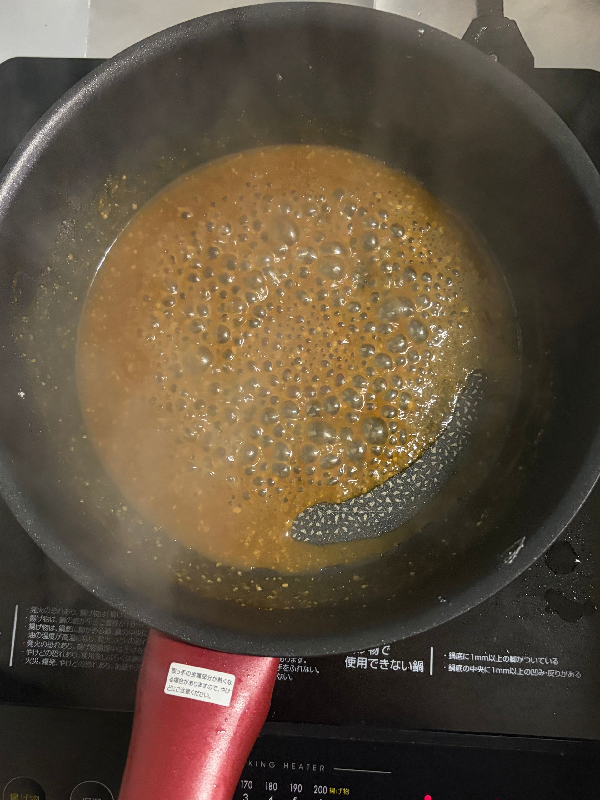 miso saus bubbling in frying pan