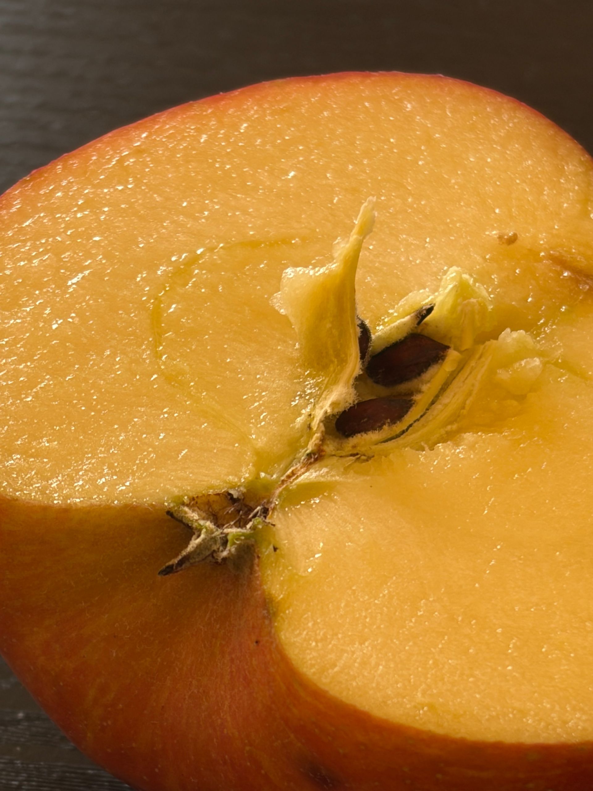 cut fuji apple with juices