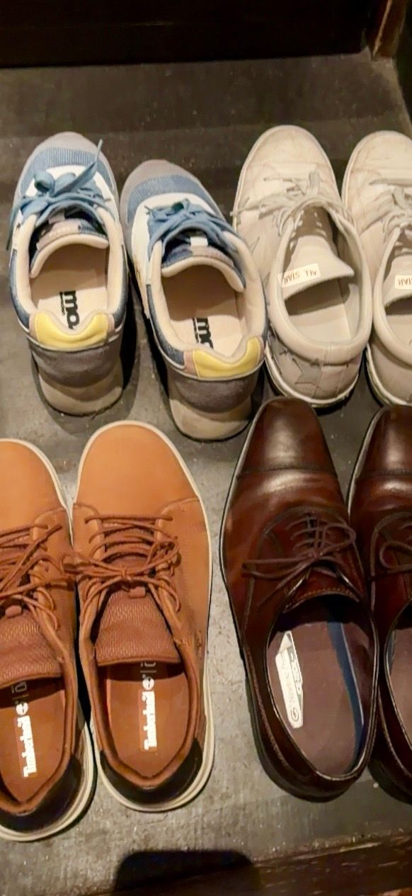 shoes with laces still tied but taken of and ready to be slipped on again