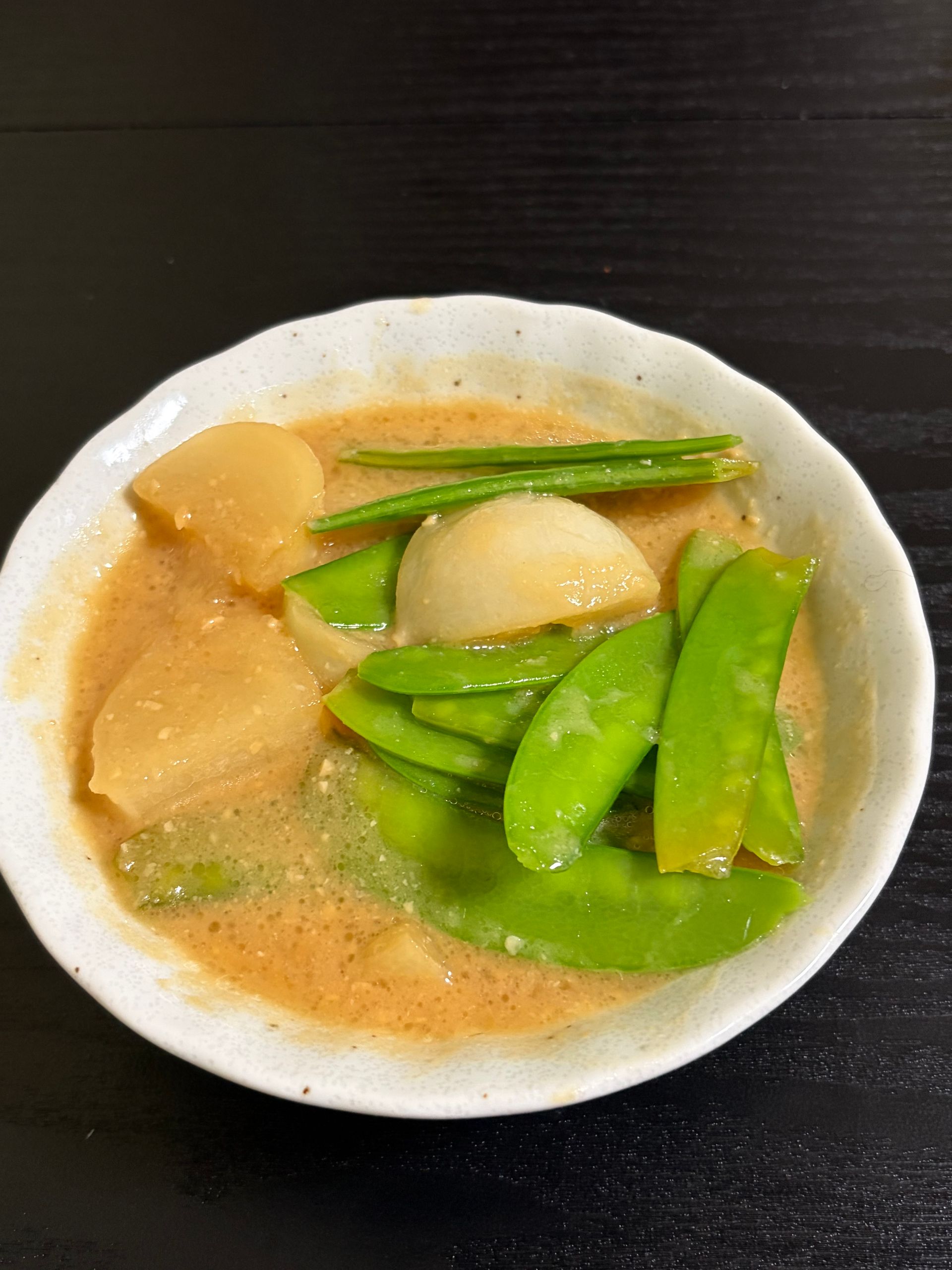 stewed mini turnips and sweet peas