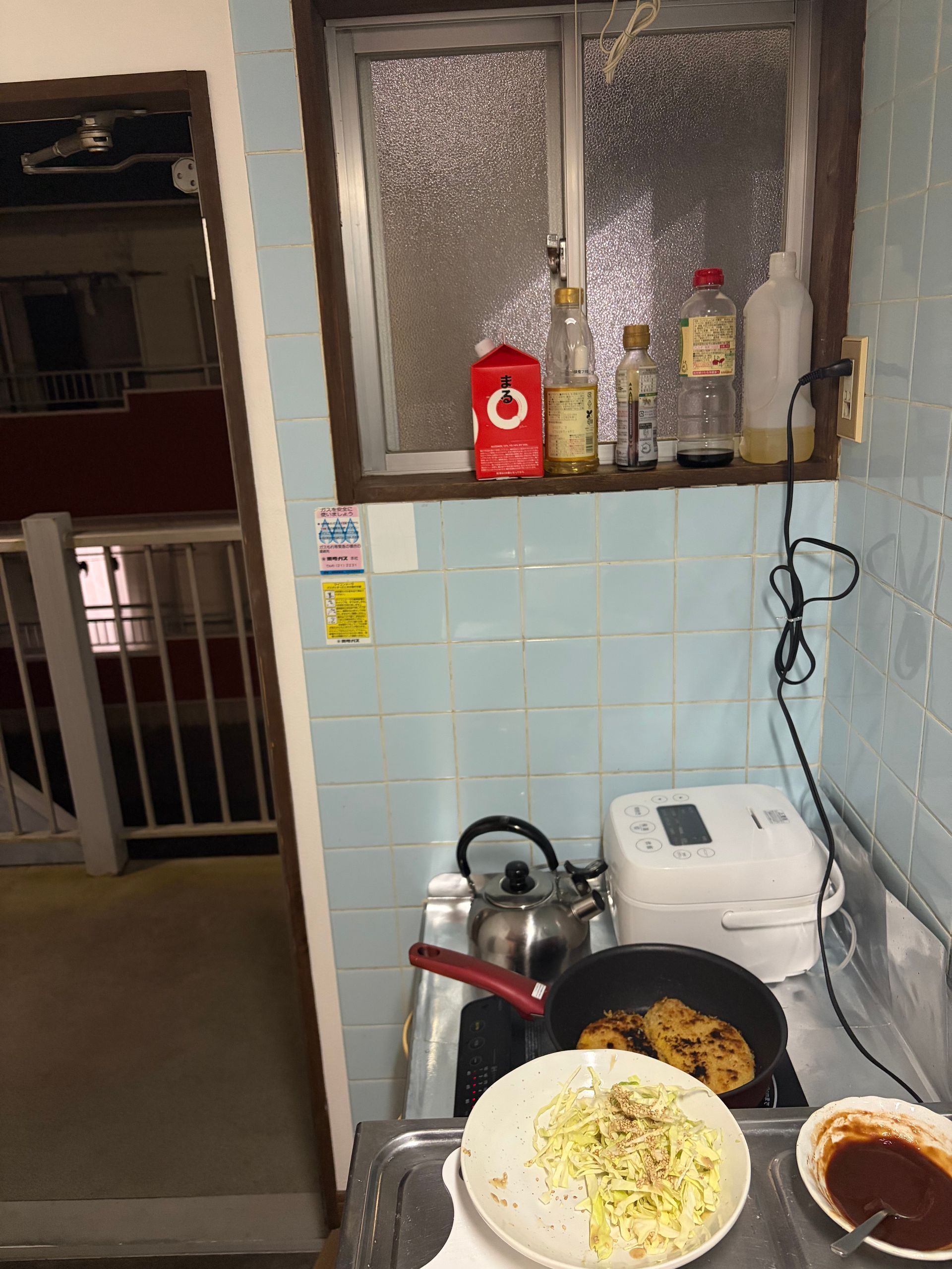 cooking tonkatsu in tiny kitchen