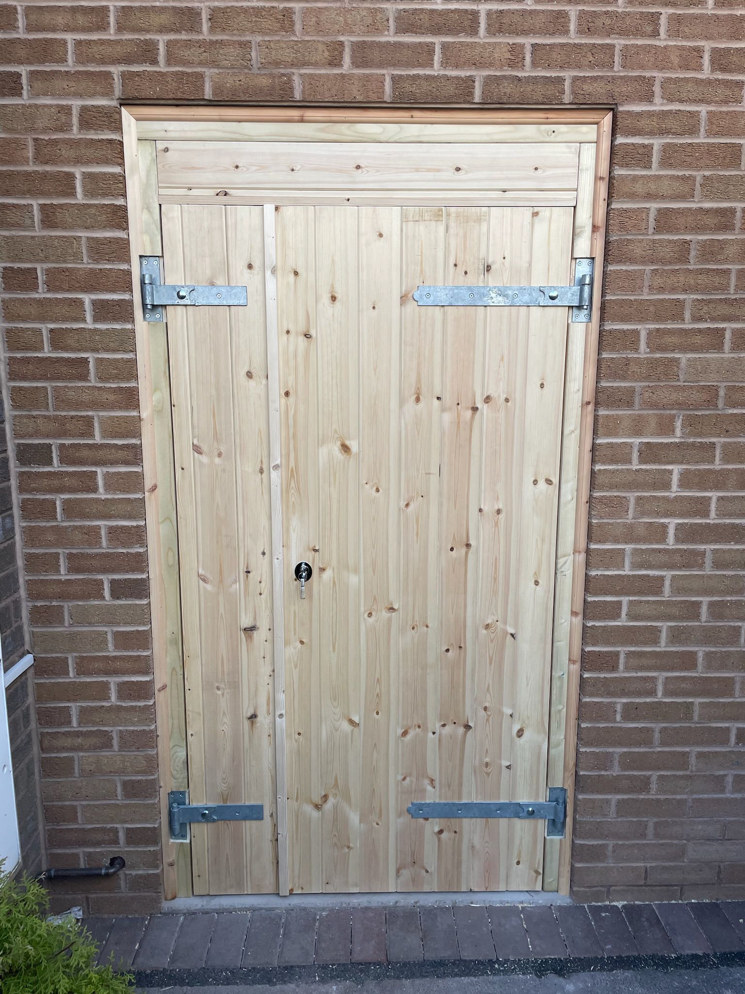 Derbyshire Joinery Specialists bespoke wide wooden garage door in Derby