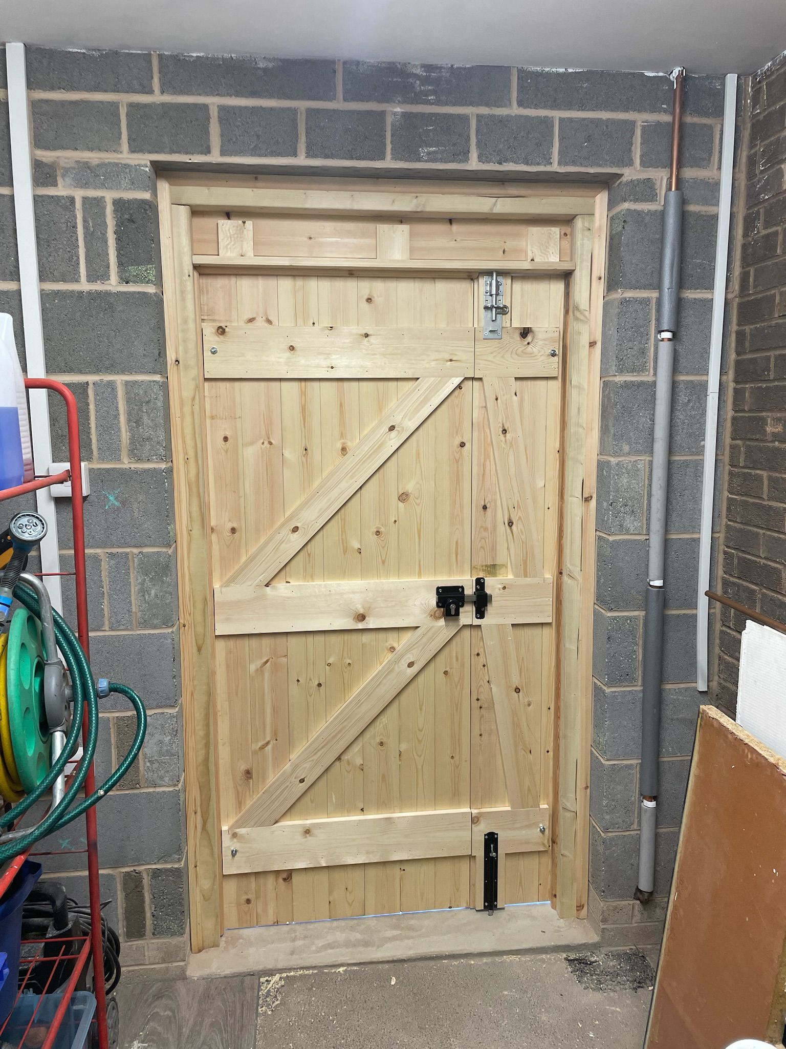 Derbyshire Joinery Specialists wide garage door in Derby with key lock