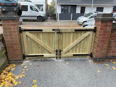 Solid wooden driveway gates fitted in Derby