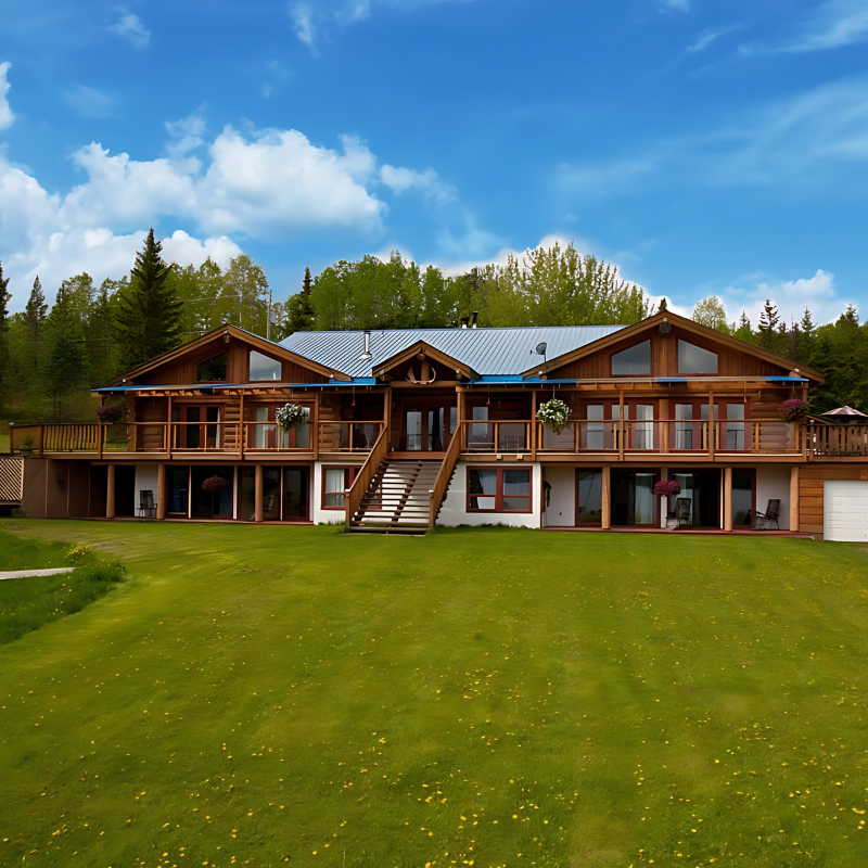 A large house with a large lawn in front of it