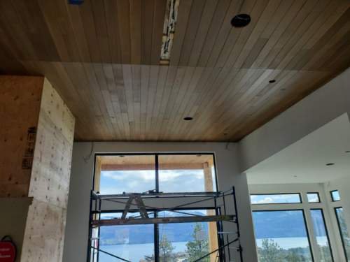 Custom wood ceiling installation by CC Patrick Stevens Exteriors