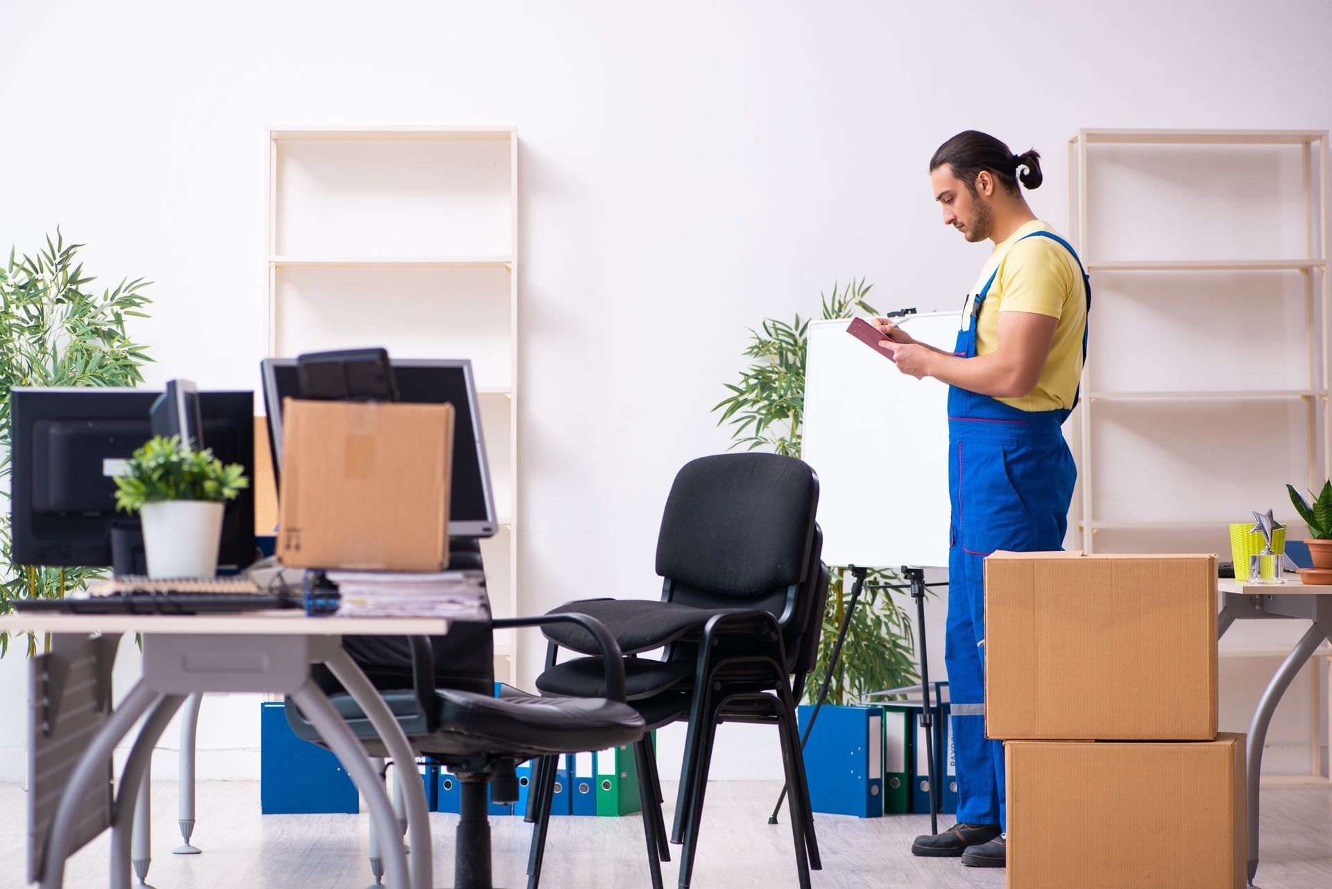 Packed boxes and furniture during the office move.