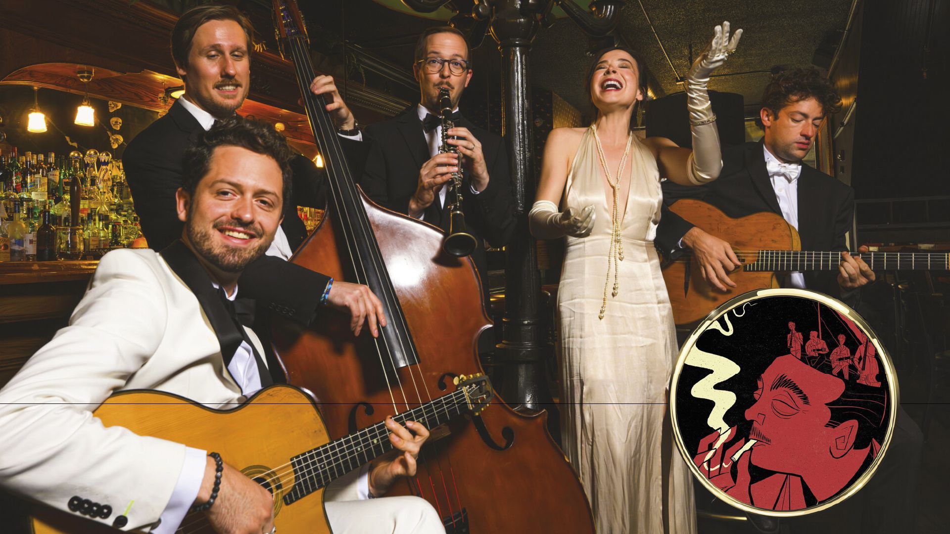 A jazz band performs in a dimly lit club. A female singer in a gown and musicians with guitars, bass, and clarinet.