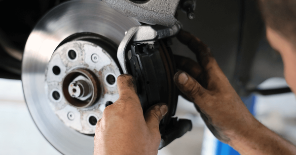 mechanic doing a pre-purchase inspection