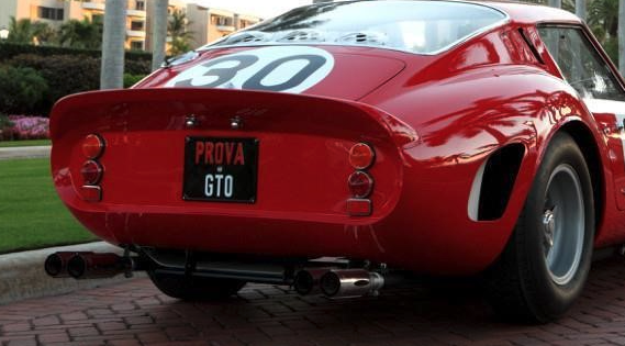 a red car with a license plate that says prova gto