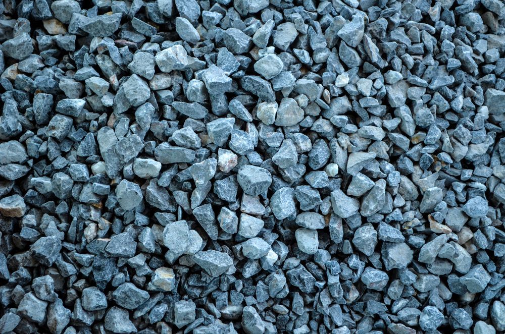A Pile of Blue Gravel is Sitting on the Ground — Bonville Landscape Centre in Bonville, NSW