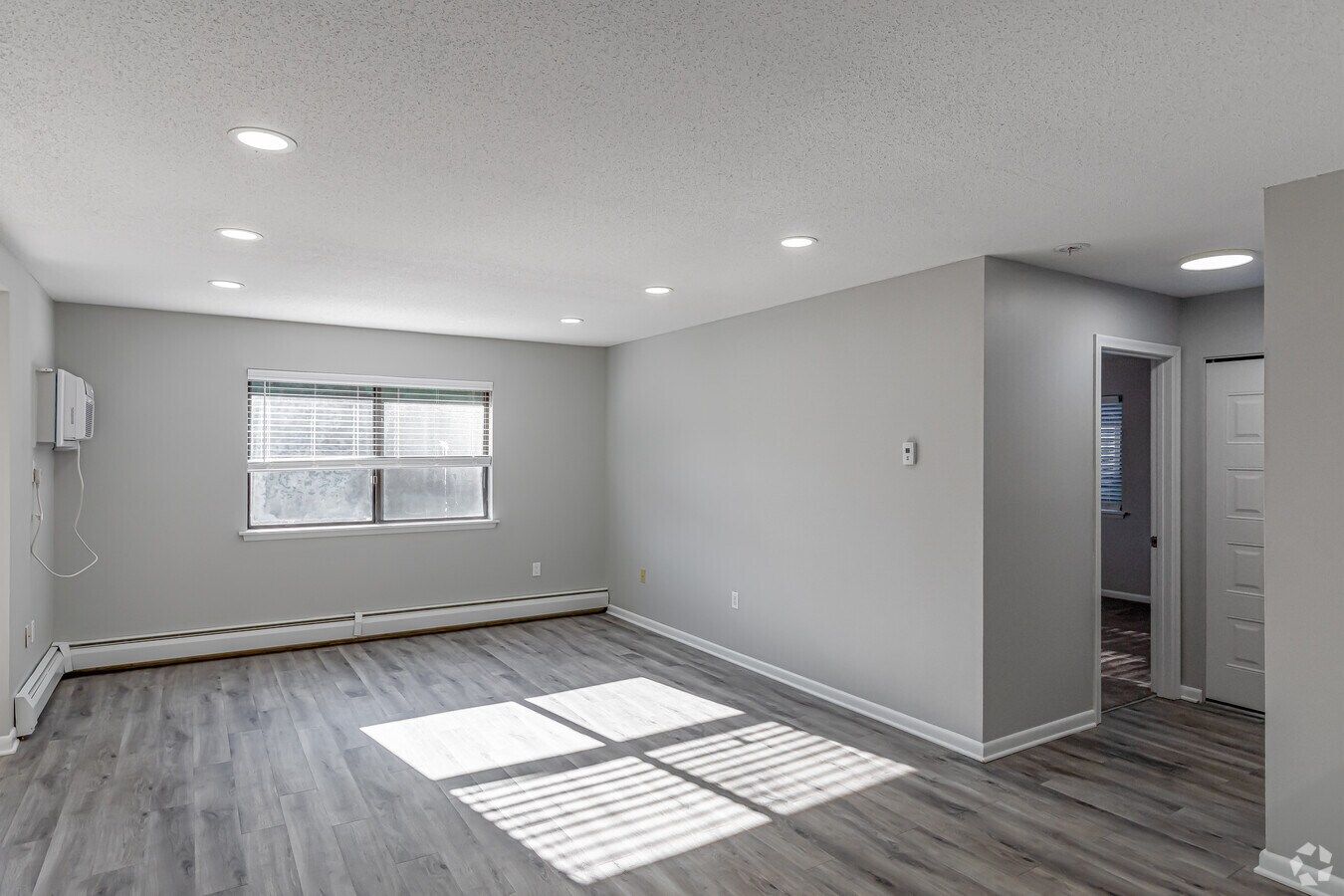 Renovated one-bedroom apartment interior at Avon Woods Apartments