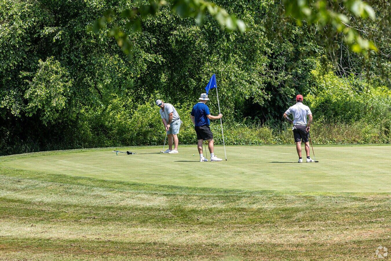 golfing at a course near Avon Woods apartments