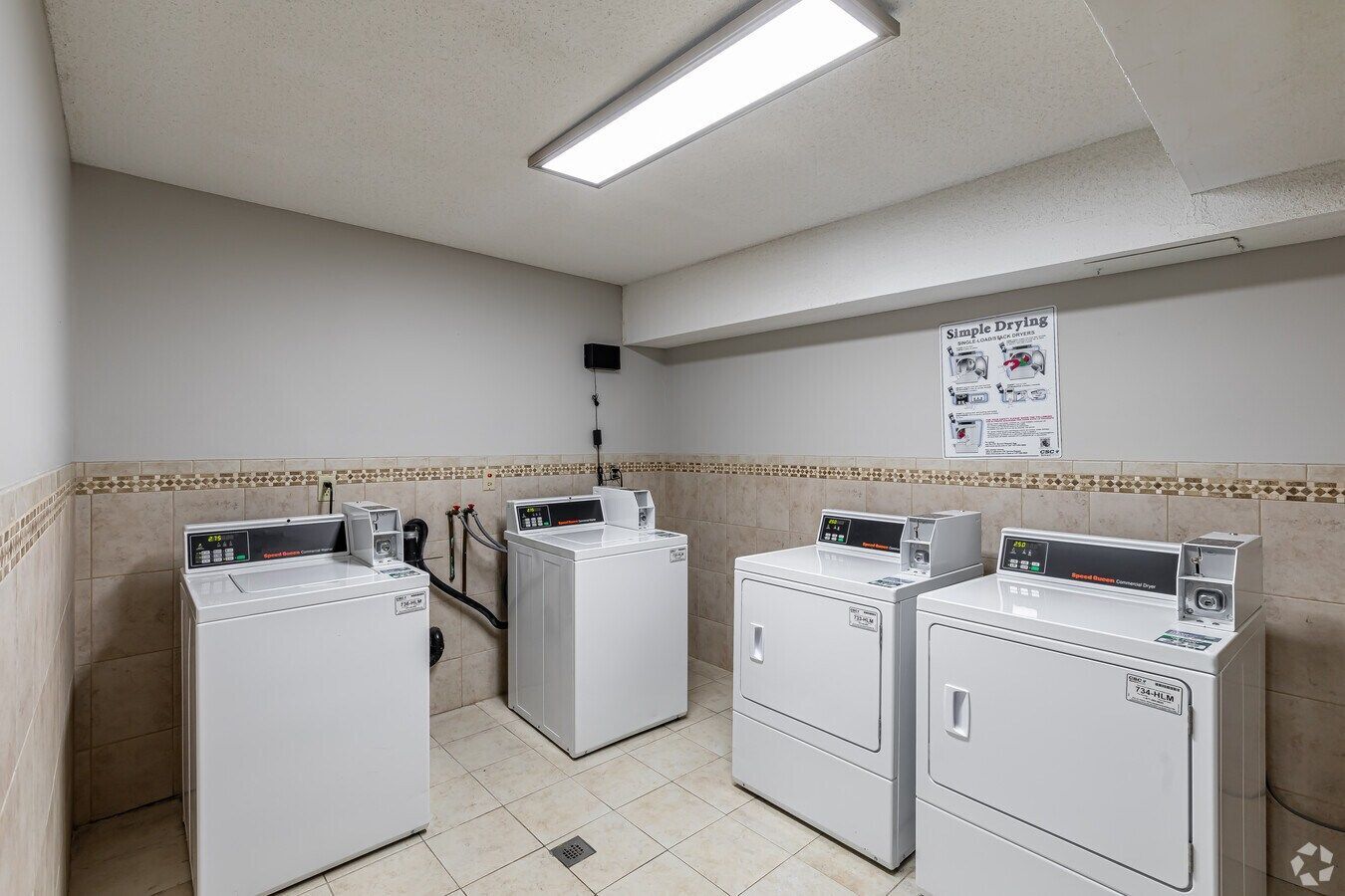 On-site laundry facilities at Avon Woods Apartments